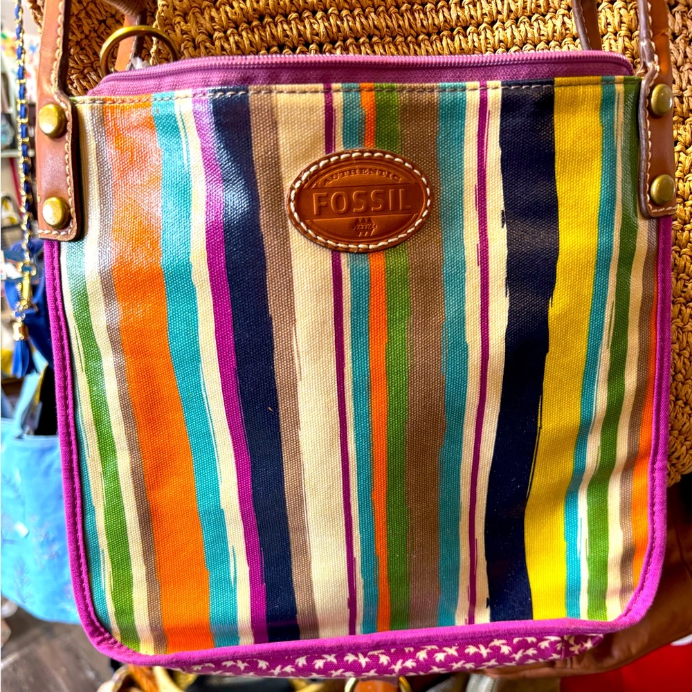 Beautiful fossil purse. Waterproof material.